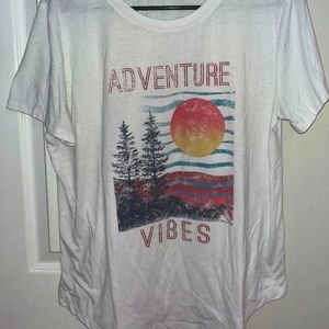 White Tee. Fits like a large.